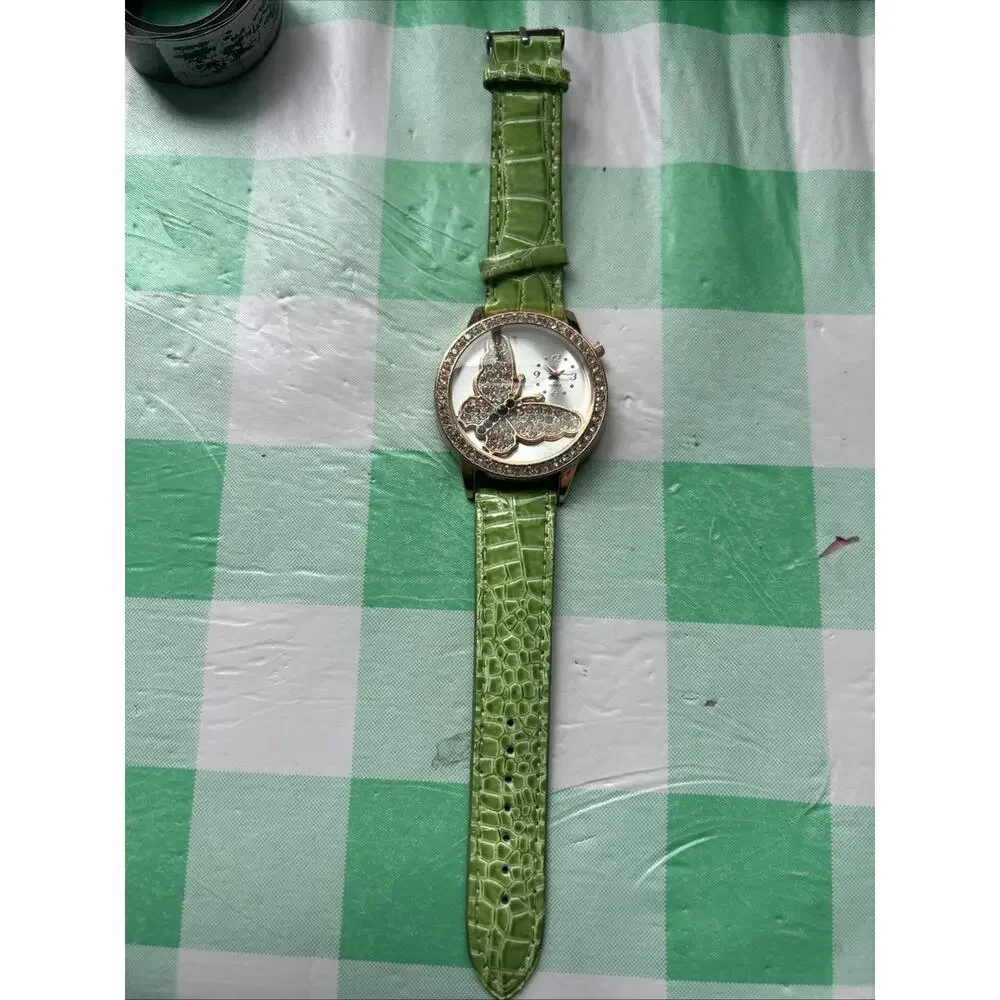 Women’s Rose Gold Tone Butterfly Dial Quartz Watch